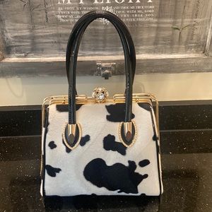 Faux cow print embellished satchel handbag
